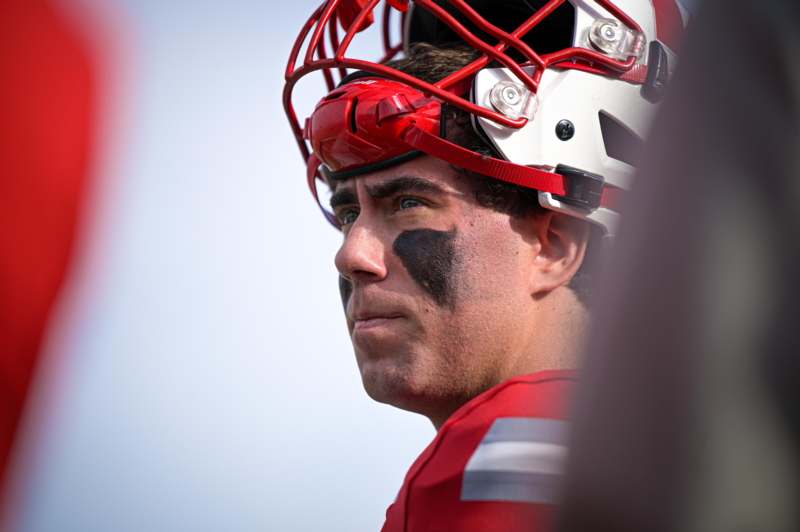 a man wearing a football helmet