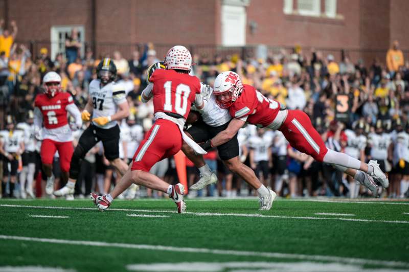 a group of football players on a field