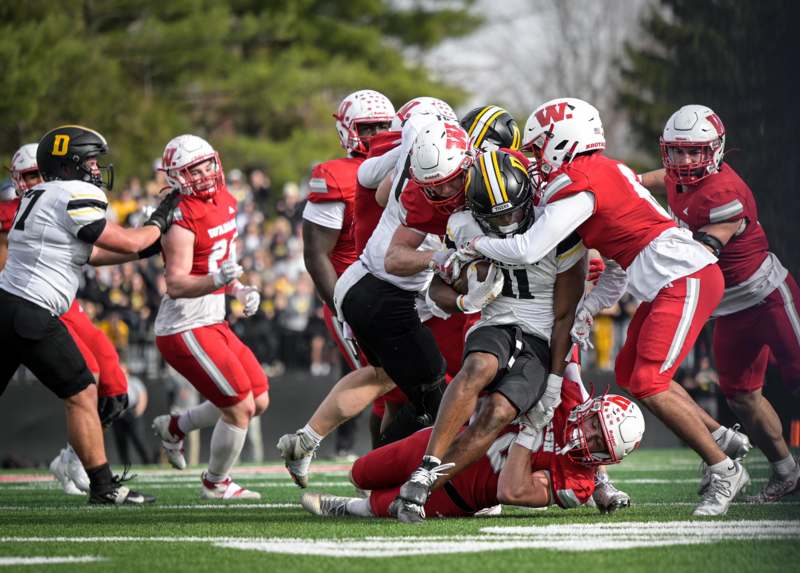 a group of football players on a field
