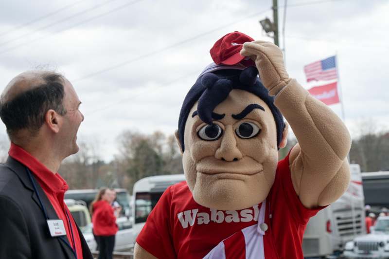 a man wearing a mascot garment