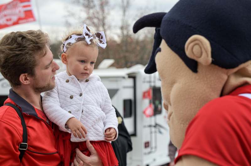 a man holding a baby