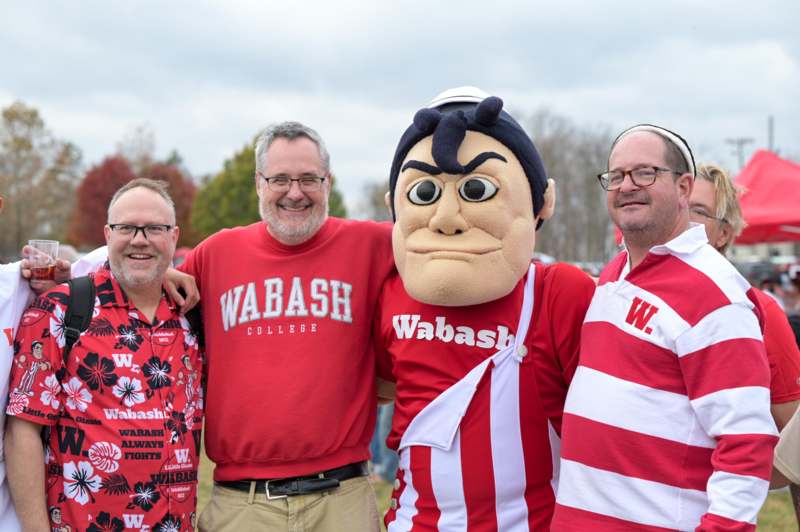 a group of men posing for a picture