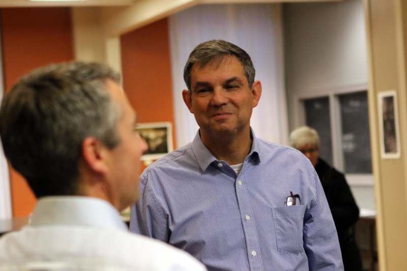 a man in a blue shirt