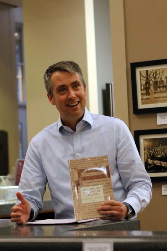 a man holding a sign