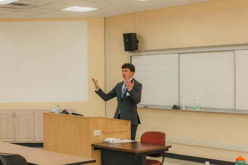 a man standing in front of a podium