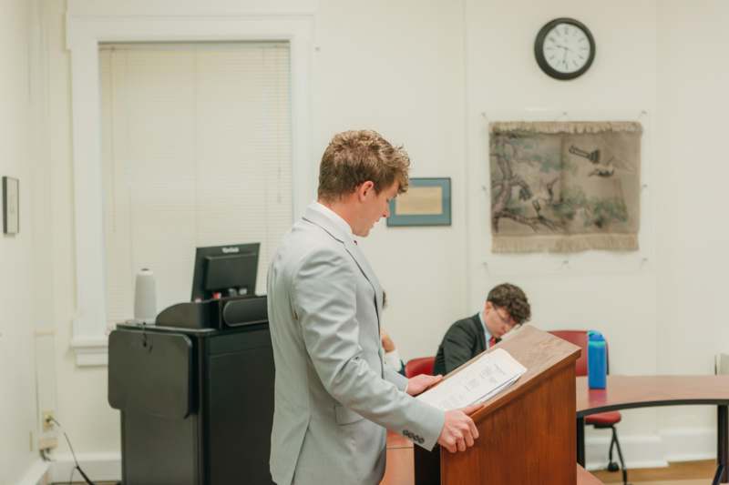 a man standing at a podium