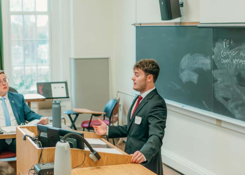 a man standing at a podium