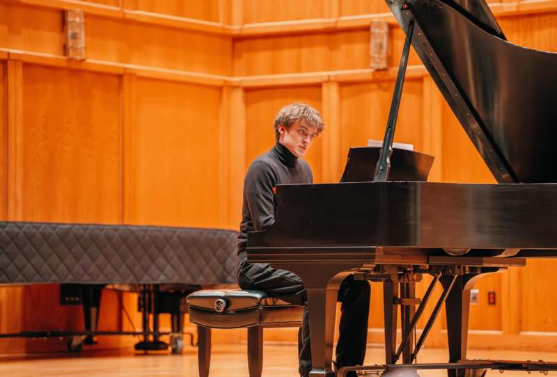 a man playing a piano