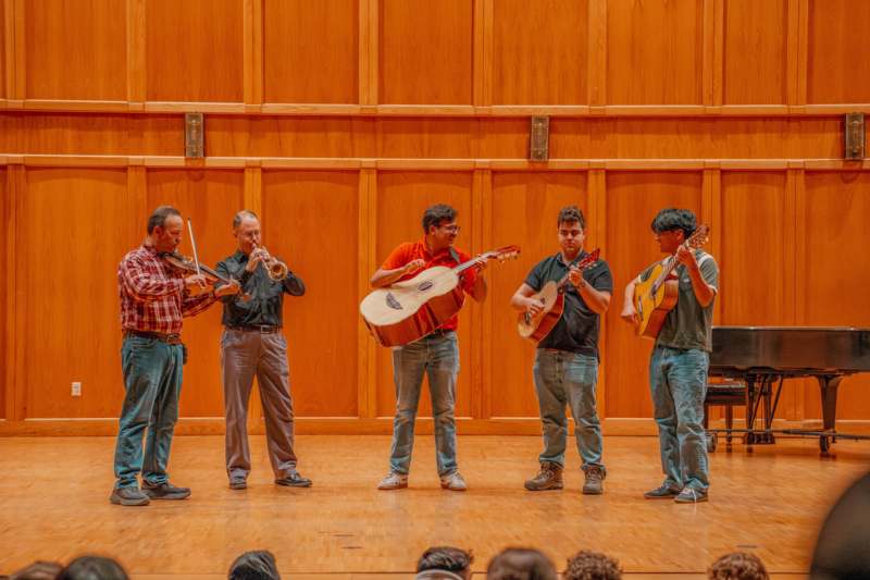 a group of people playing instruments