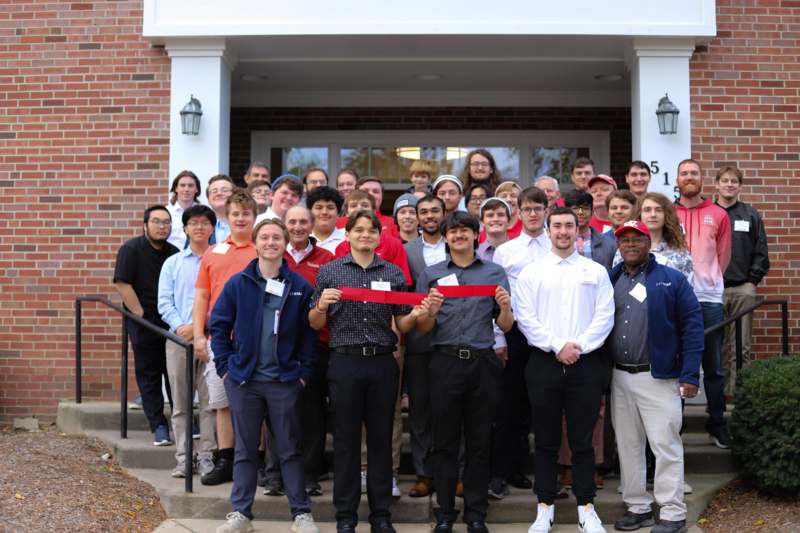 a group of people standing on stairs