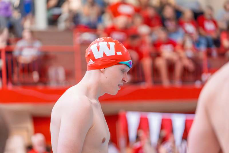 a man wearing a swim cap