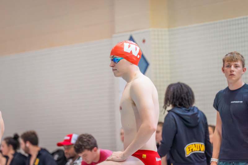 a man in swimsuit and goggles