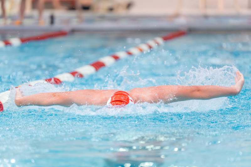 a person swimming in a pool