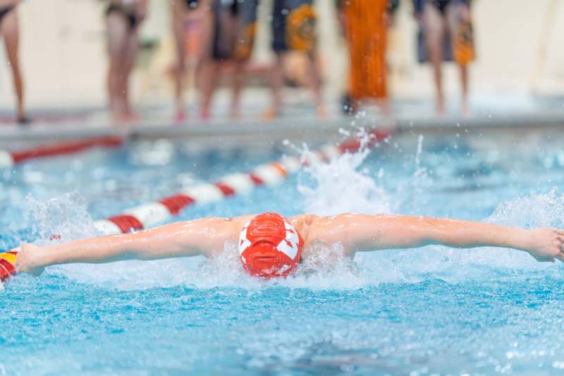 a person swimming in a pool