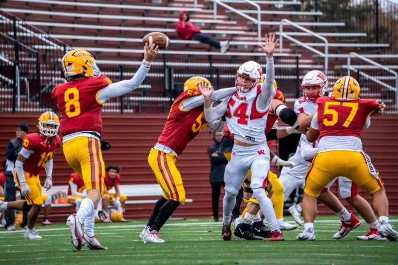 a group of football players on a field