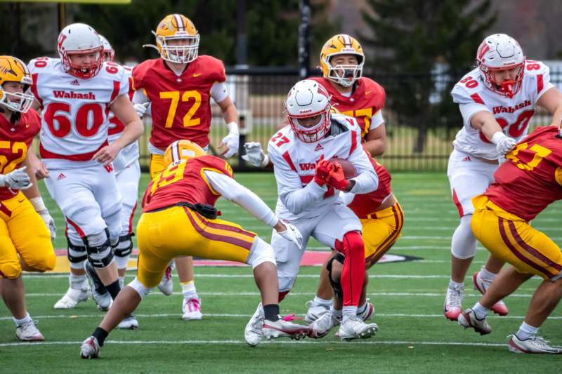 a group of people playing football