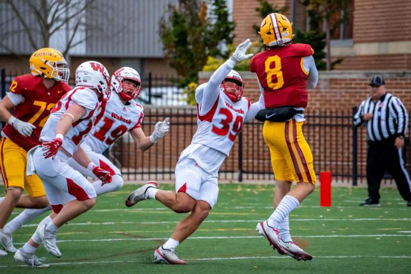 a group of football players on a field