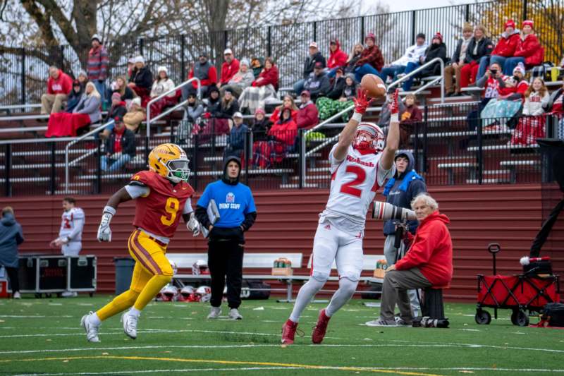 a football player catching a football