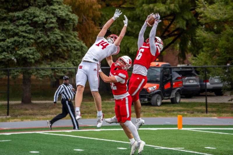a group of people playing football