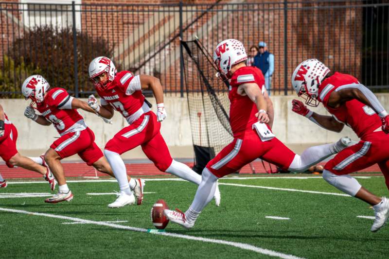 a group of football players on a field
