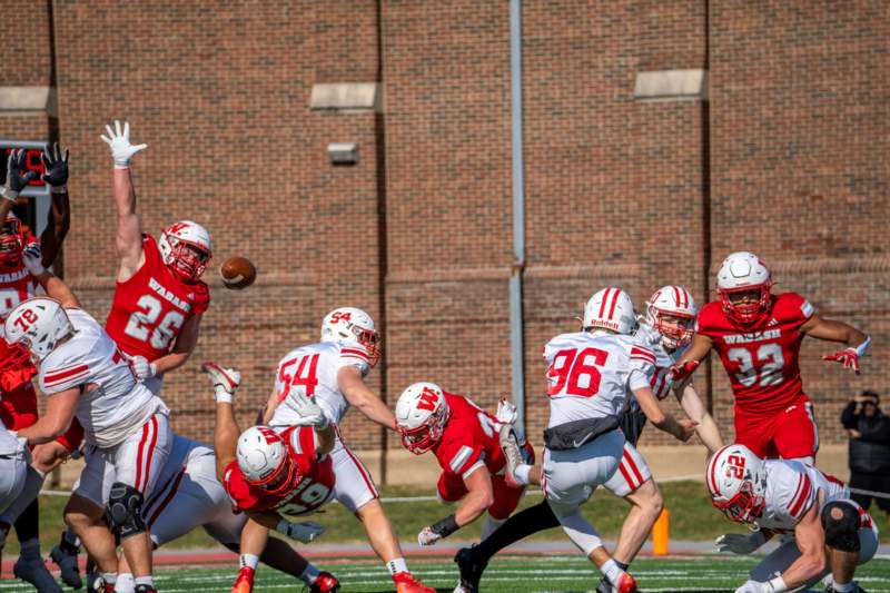 a group of football players on a field