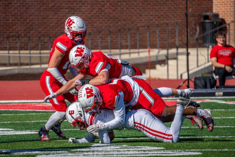 a group of football players on a field