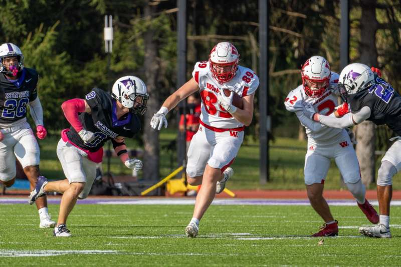 a group of people playing football