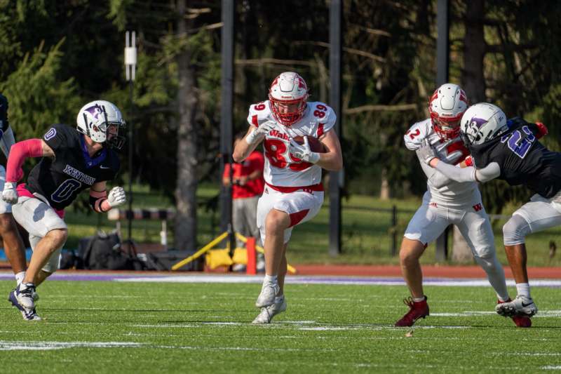 a group of people playing football