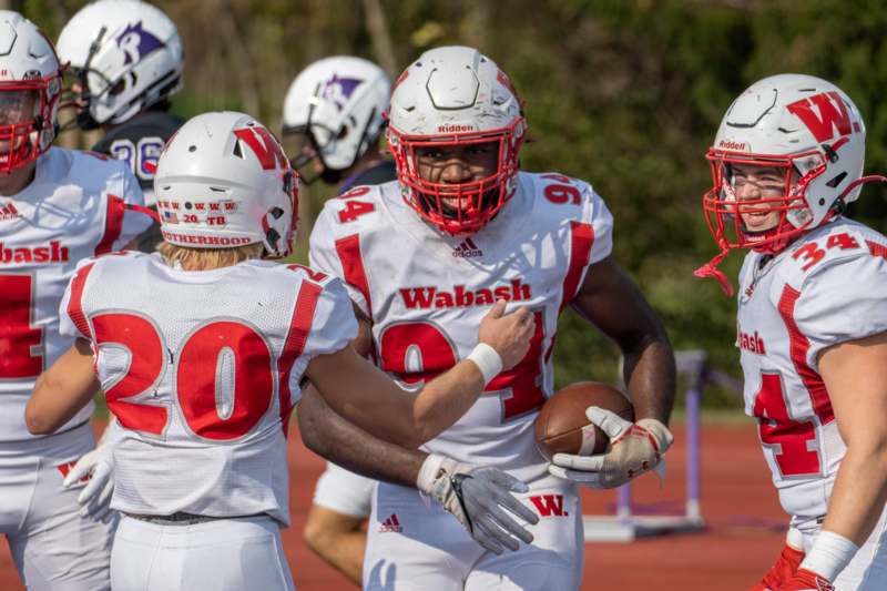 a group of football players on a field