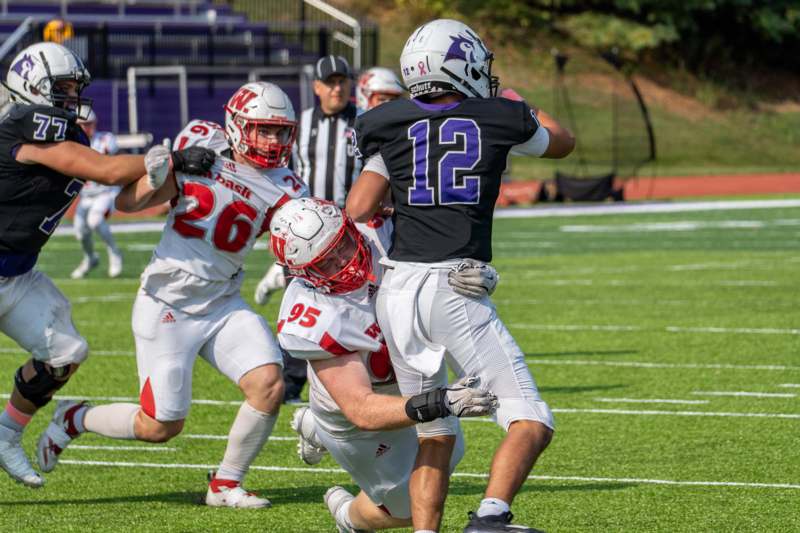 a group of people playing football