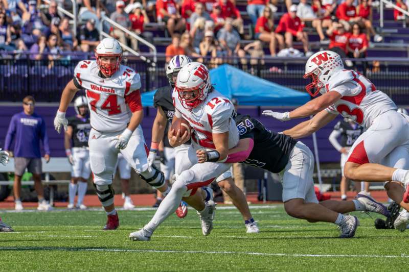 a group of football players on a field