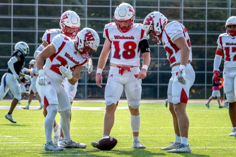 a group of football players on a field