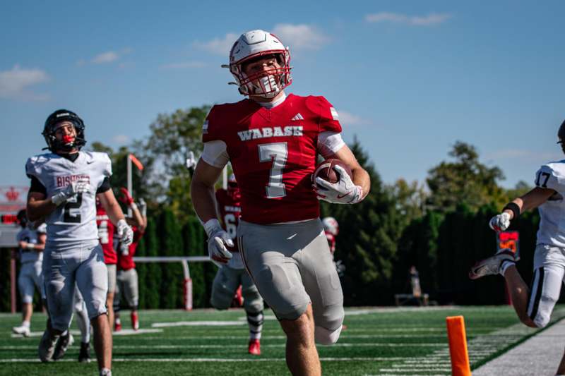 a football player running on a field