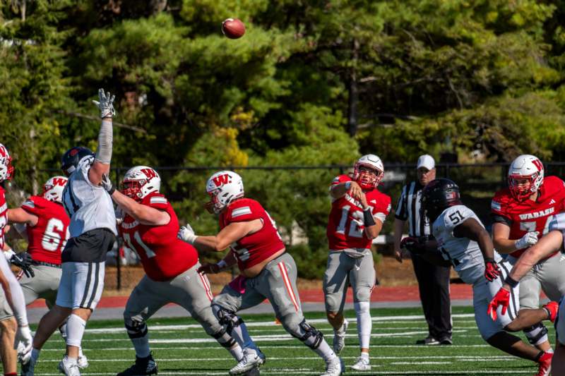 a group of men playing football