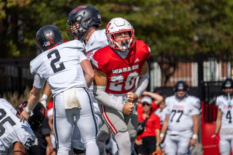 a group of people playing football