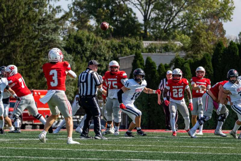a group of people playing football