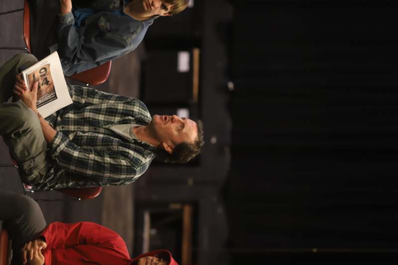 a group of people sitting in chairs