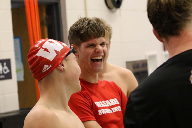 a group of boys laughing