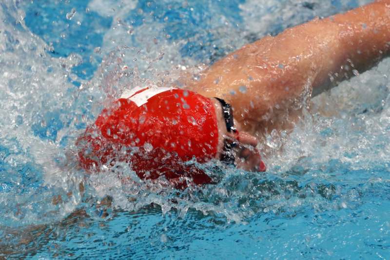 a person swimming in a pool