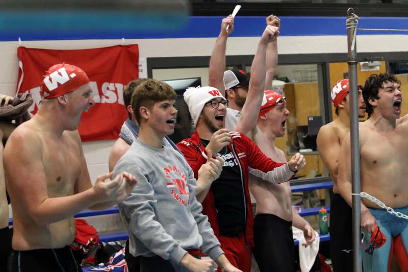 Gail Pebworth Invitational, Day 1 - a group of men in swim caps