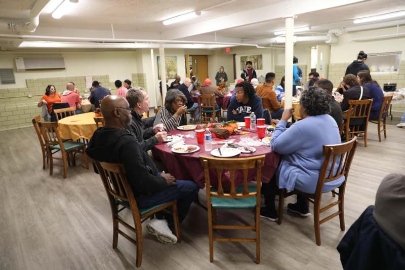 a group of people sitting at a table
