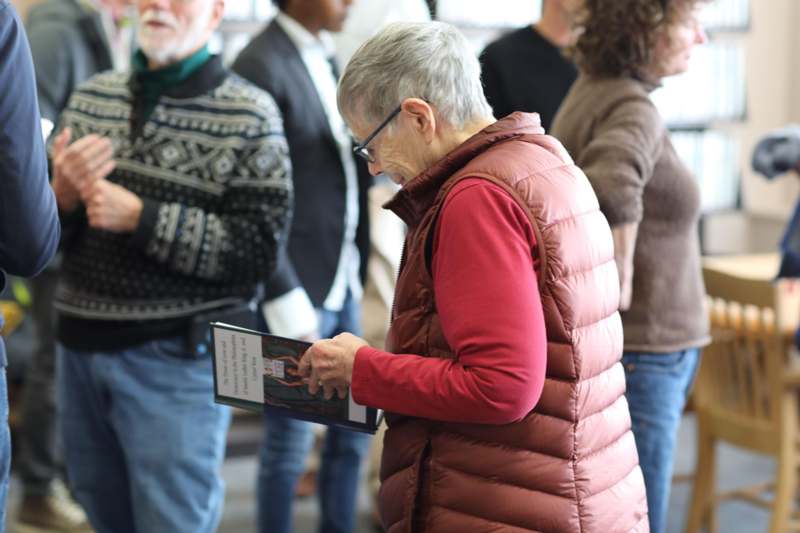 a woman holding a book