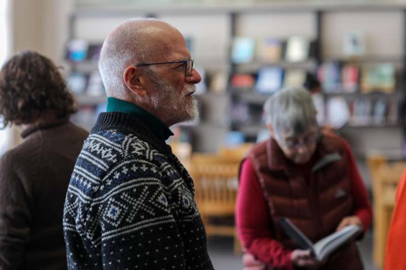 a group of people in a library
