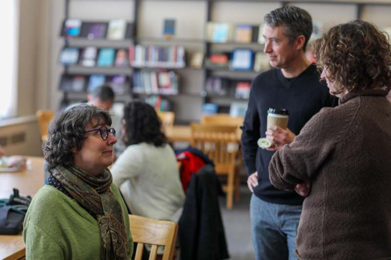 a group of people in a library