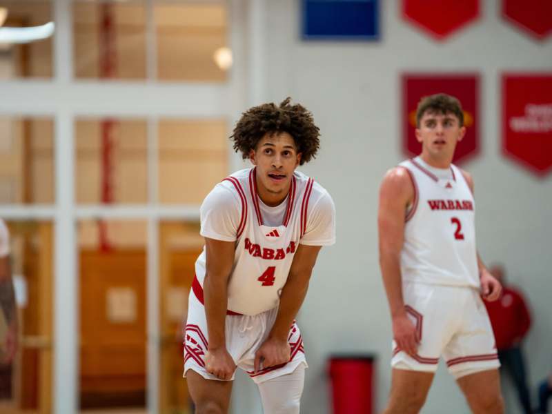 a group of men in sports uniforms