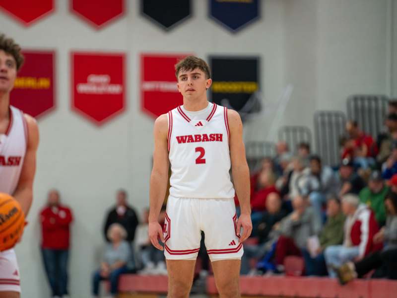 a man in a basketball uniform