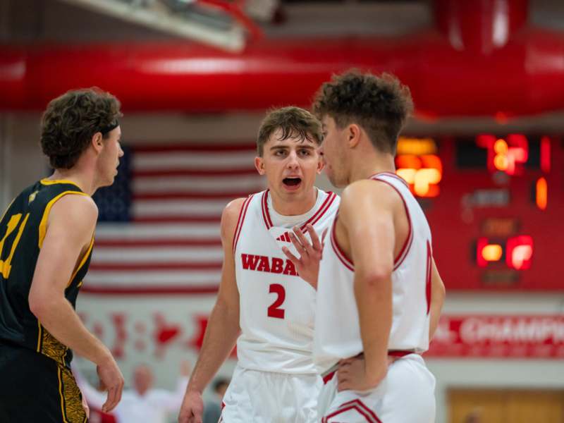 a group of men in a basketball game