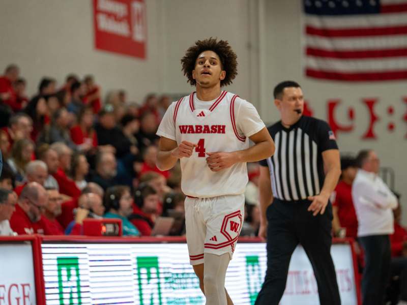 a man running in a basketball court