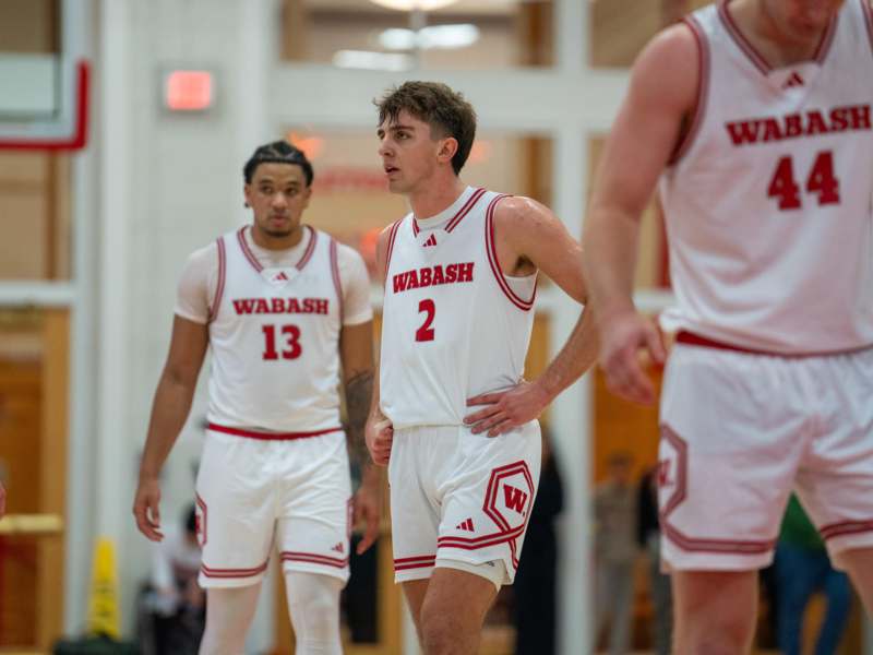 a group of men in basketball uniforms