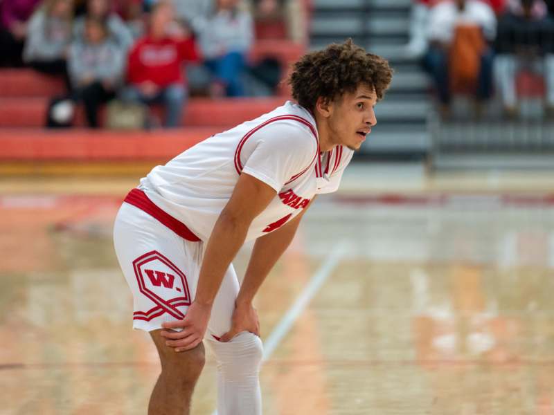 a man in a basketball uniform